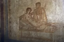 Foto över en erotisk målning i Pomeiji.